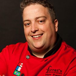 Photo of Mark Forrat in red chefs coat
